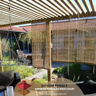 Timber pergola installed over an outdoor entertaining area
