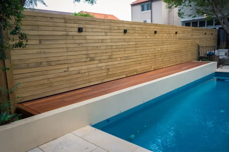 A timber deck around a pool