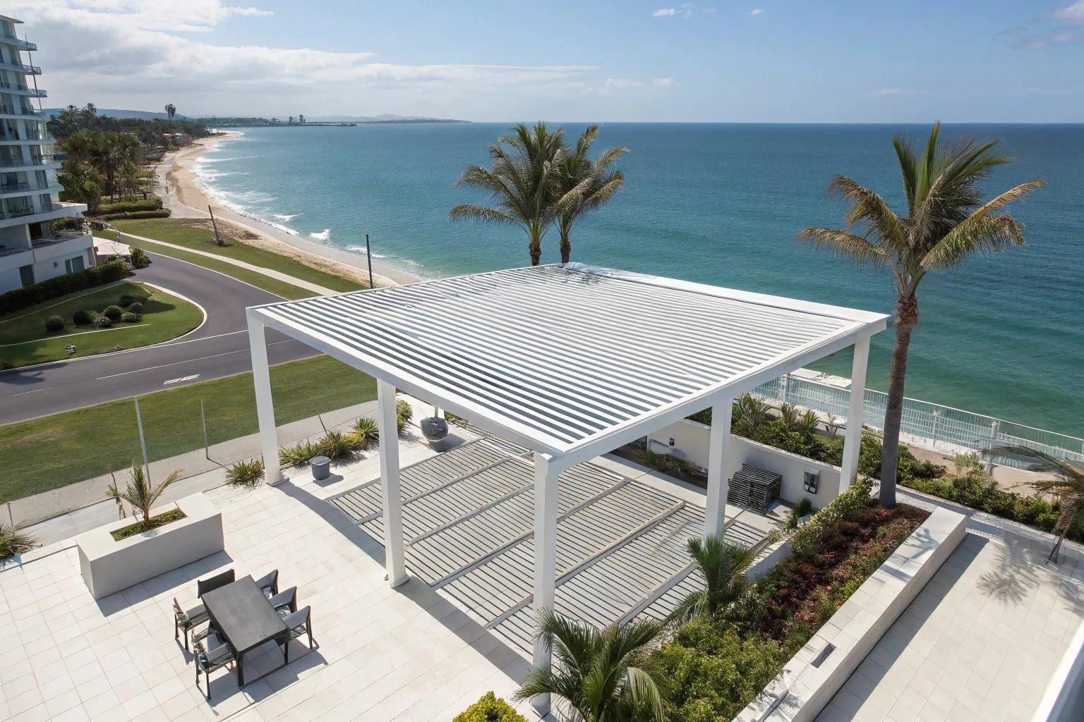 Aerial view of a modern white coastal pergola with