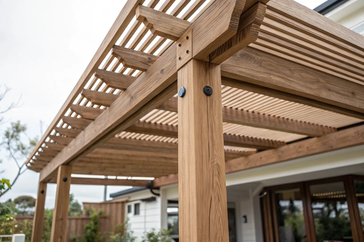 A timber deck with an open louvred roof in a suburban Gold Coast home