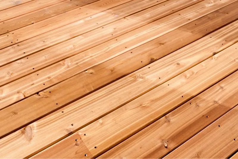 Weathered pergola timber before cleaning and resealing