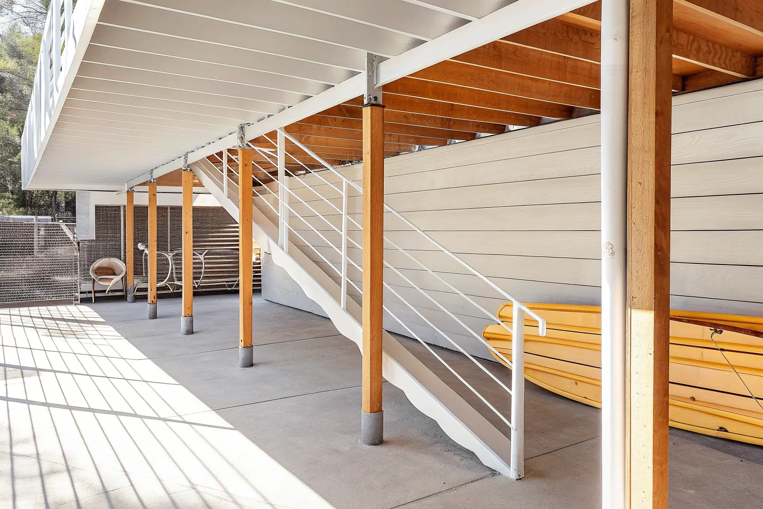 Underneath view of an elevated timber deck being u